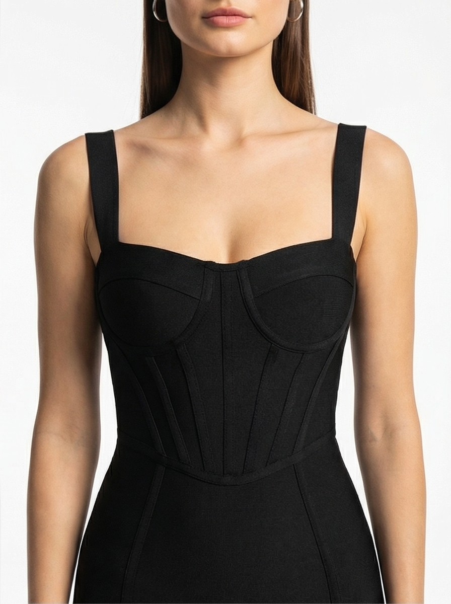 Black dress with a fitted bodice on a white background