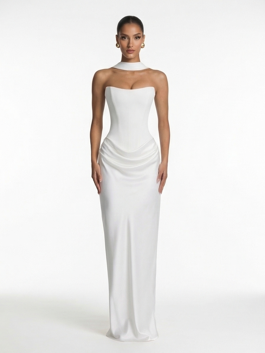 Woman wearing a white strapless gown on a white background
