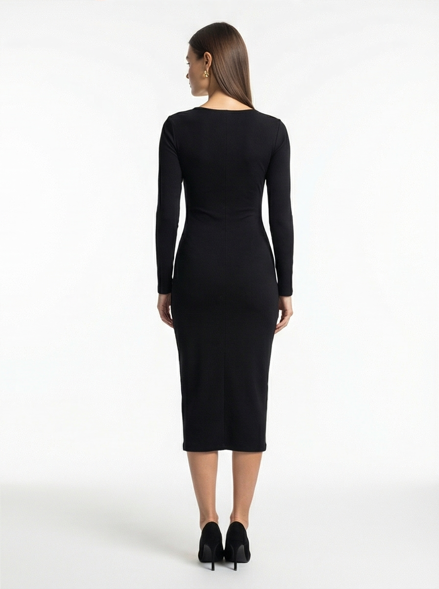 Woman wearing a black dress on a white background
