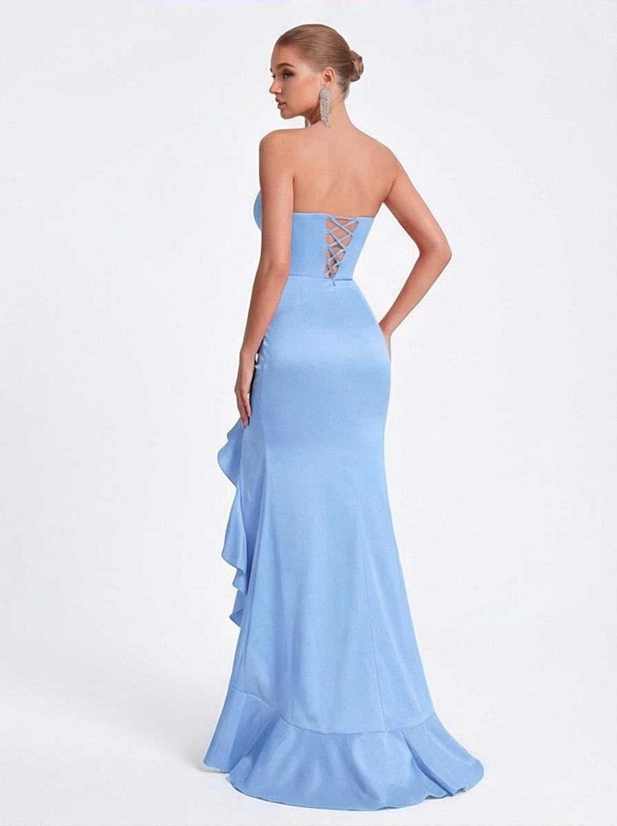 Light blue strapless gown with ruffled details on a white background