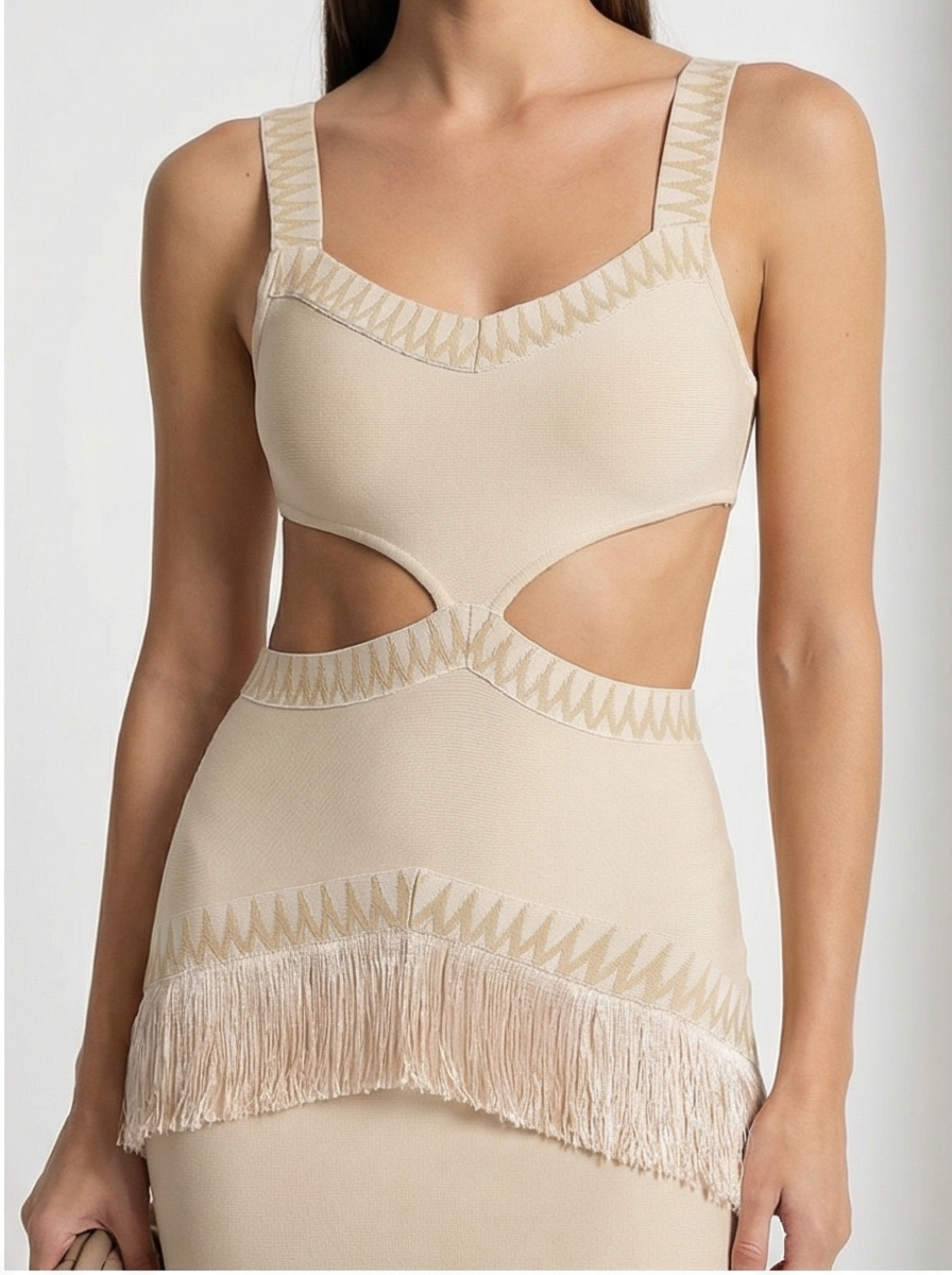 Beige tank top with cut-out design on a plain background