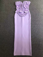 Lavender strapless dress with floral embellishments on a gray background
