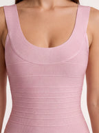 Close-up of a pink sleeveless top with a plain background