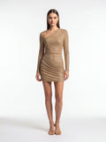 Woman wearing a beige long-sleeve dress on a white background