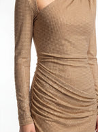 Gold dress with long sleeves and a fitted silhouette on a white background