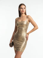 Gold metallic bodycon dress with square neck and spaghetti straps pose